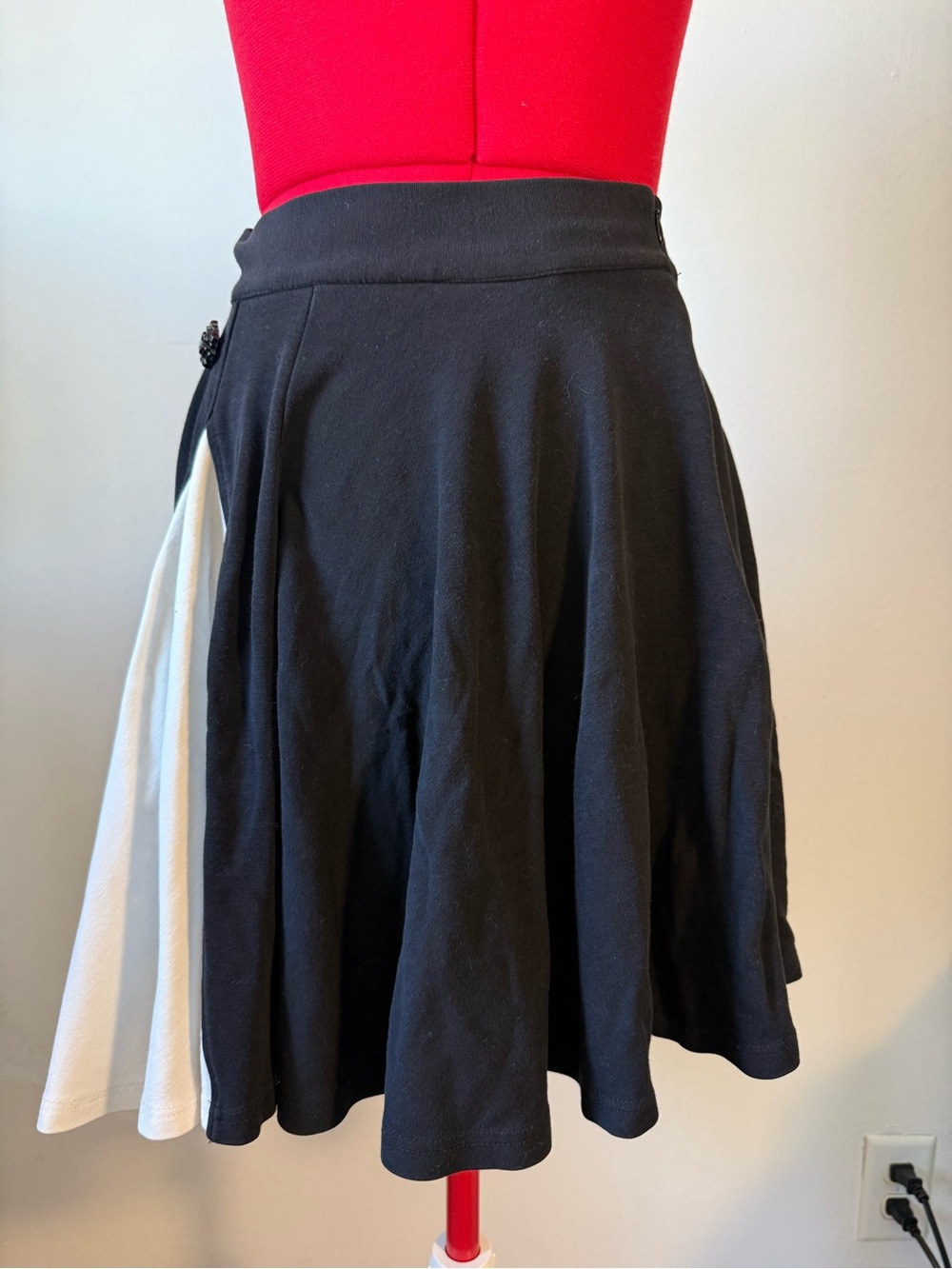 Black Voodoo Vixen Flared Skirt with White Side Pleat and Rose Button Detail